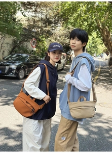 Outdoor shot of caramel and beige nylon crossbody bags for men and women