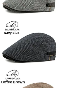 Detail of vintage plaid wool flat caps in navy, coffee, and grey with metal buckles