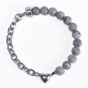 Detail of grey marble beads and silver steel chain with heart-shaped magnetic clasp