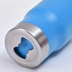 Detail view of the blue insulated bottle bottom featuring a built-in steel bottle opener
