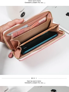Pink long wallet showing spacious interior with card slots and a dedicated phone compartment