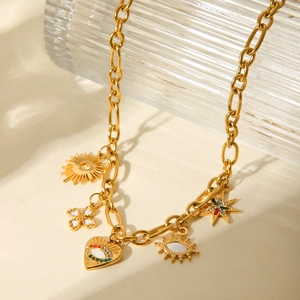 Gold evil eye stainless steel necklace with sun and heart charms and crystal inlay