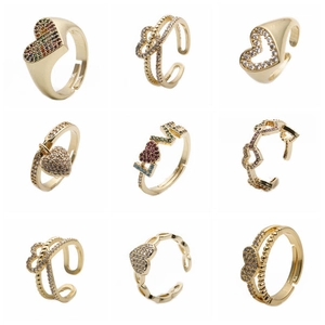 Gold plated copper heart rings set with zircon stones and LOVE lettering charms
