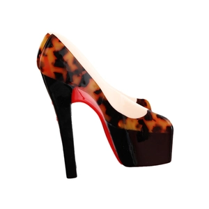 Elegant tortoiseshell print high heels with black platform and iconic red sole