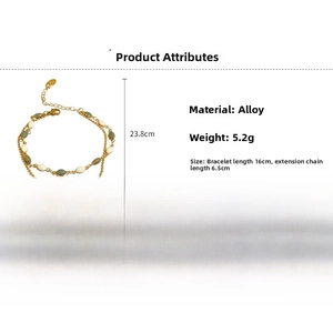 Detail of 16cm double-layer gold plated bracelet with green and white beads