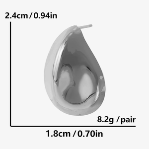 Detailed view of silver teardrop earring with dimensions 2.4cm by 1.8cm and 8.2g weight