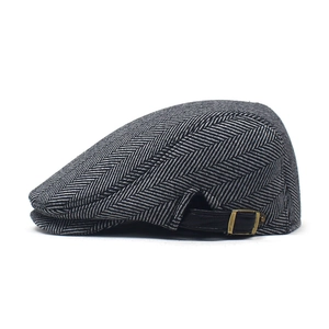 Men's winter grey herringbone flat cap with adjustable leather strap and bronze buckle