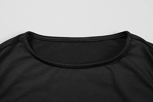 Detail of the high-quality stitching and smooth crew neck of this elegant black dress