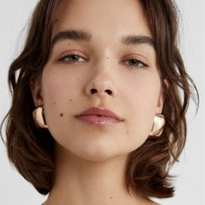 Elegant 18k gold plated stainless steel geometric square earrings worn by a model
