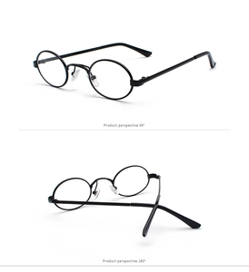 Macro view of vintage small oval metal glasses frame with clear silicone nose pads