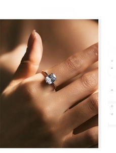 Close-up of elegant S925 silver ring featuring a sparkling oval-cut four-claw zircon stone