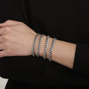 Detailed comparison of four different widths of silver titanium steel Cuban link bracelets