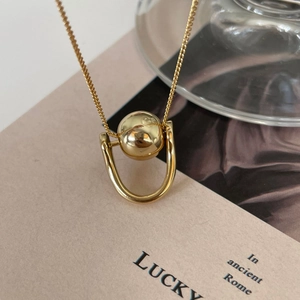 Minimalist 925 silver golden necklace featuring a U-shaped frame and movable metal bead