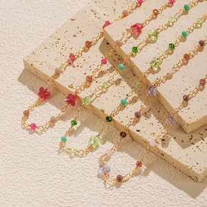 Ethnic 18K gold plated necklace featuring colorful resin butterflies and beaded accents