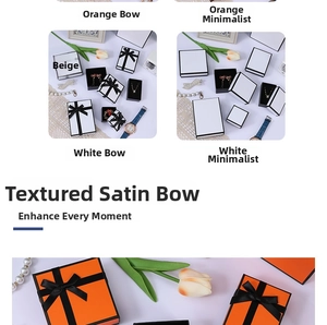 Detail of orange jewelry gift box with black ribbon and elegant velvet lining for necklaces