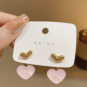 Pink marble texture heart drop earrings with gold metal studs on white display card