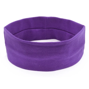 Macro detail of purple elastic yoga headband showing soft knitted texture and stitch work