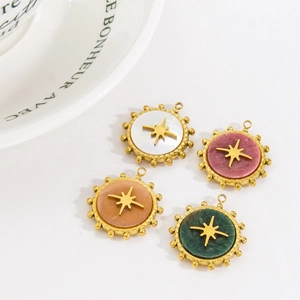Bohemian style stainless steel pendants with starburst relief and natural stone inlay