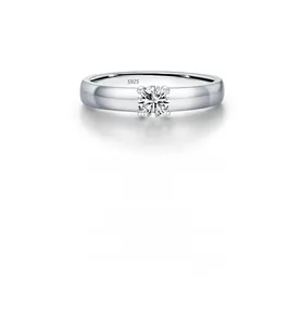 Macro detail of S925 sterling silver ring showing classic four-prong diamond setting