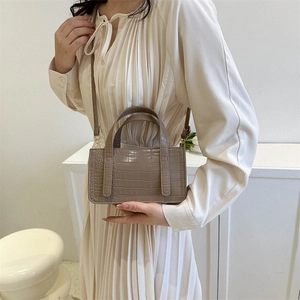 Stylish light brown crocodile textured crossbody handbag for women in a modern square shape