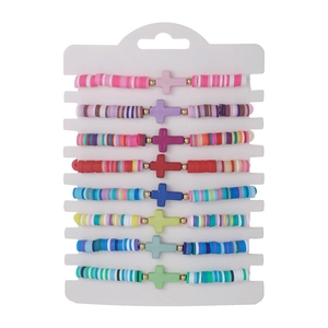 Bohemian colorful clay bead bracelet set with cross charms and gold spacers on card