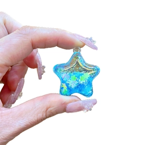 Glittery blue pentagram star resin pendant with laser sequins and metal ring hook