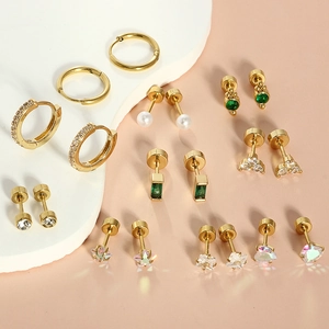10 pairs of golden stainless steel stud earrings set with opal, zircon and stars