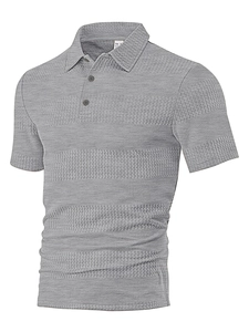 Detailed view of grey short sleeve polo shirt showing waffle texture and knit fabric