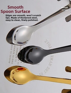 Macro detail of three-color polished stainless steel cat spoons with smooth edges