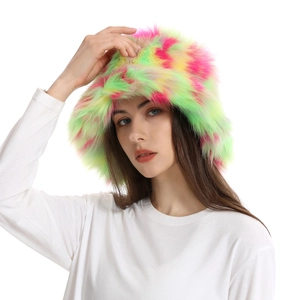 Detail view of colorful faux fur bucket hat with soft plush texture and rainbow stitching