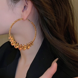 Créoles dorées chic avec gouttes en cristal champagne pour un style élégant et mode