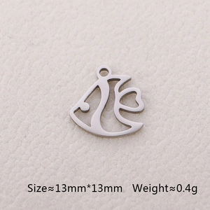 Detailed macro view of 13mm silver stainless steel fish charm with hollow heart design