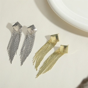 Modern minimalist gold and silver fringe earrings with textured square studs and tassels