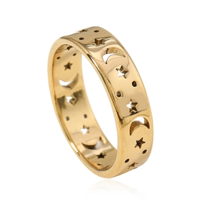 Golden stainless steel band ring with hollow star and moon patterns on a white background