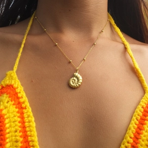 18k gold plated stainless steel seashell necklace with freshwater pearls on model