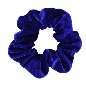 Close-up of royal blue velvet scrunchie showing the soft texture and elastic fabric