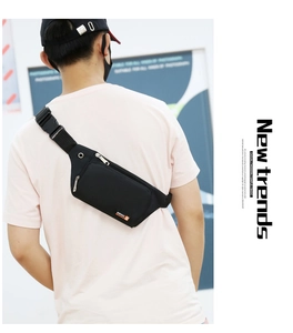 Detail of black oxford fabric sports waist bag showing adjustable strap and quick-release buckle