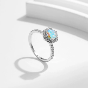 S925 sterling silver ring featuring a hexagonal iridescent stone with halo diamonds