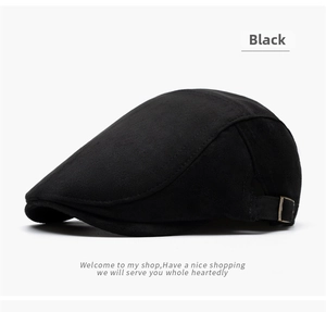 Detail of adjustable metal buckle on black flat cap with textured fabric for autumn