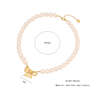 Detail showing long tassel pearl necklace with bow pendant and exact size measurements