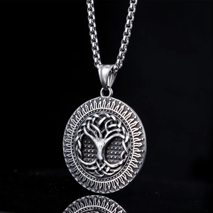 Detailed relief of Viking Tree of Life pendant with solar pattern on square box chain