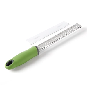 Stainless steel cheese grater with green handle and protective cover on white background