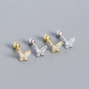 Macro detail of S925 sterling silver butterfly earrings with sparkling cubic zirconia stones