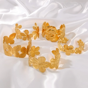 Gold leaf butterfly flower stainless steel open cuff bracelet with detailed engraving