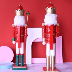 62cm wooden nutcracker king figures with glitter red outfits and scepters on red background