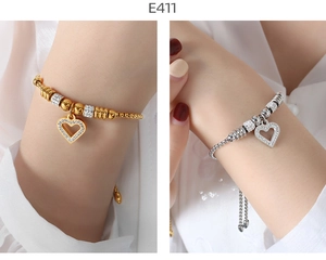 Detail of 18K gold and silver plated heart pendant bracelets with micro-inlaid zircon