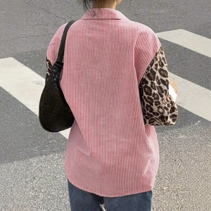 Detail back view of a pink striped long sleeve shirt with leopard print patchwork sleeves