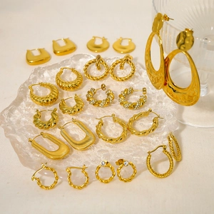 French vintage gold crescent hoop earrings collection in various stylish geometric designs