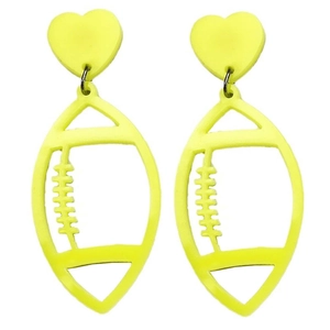 Macro detail of yellow acrylic rugby ball earrings with heart accents on a white background