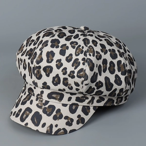 Close-up of leopard print newsboy cap with classic beige octagonal design